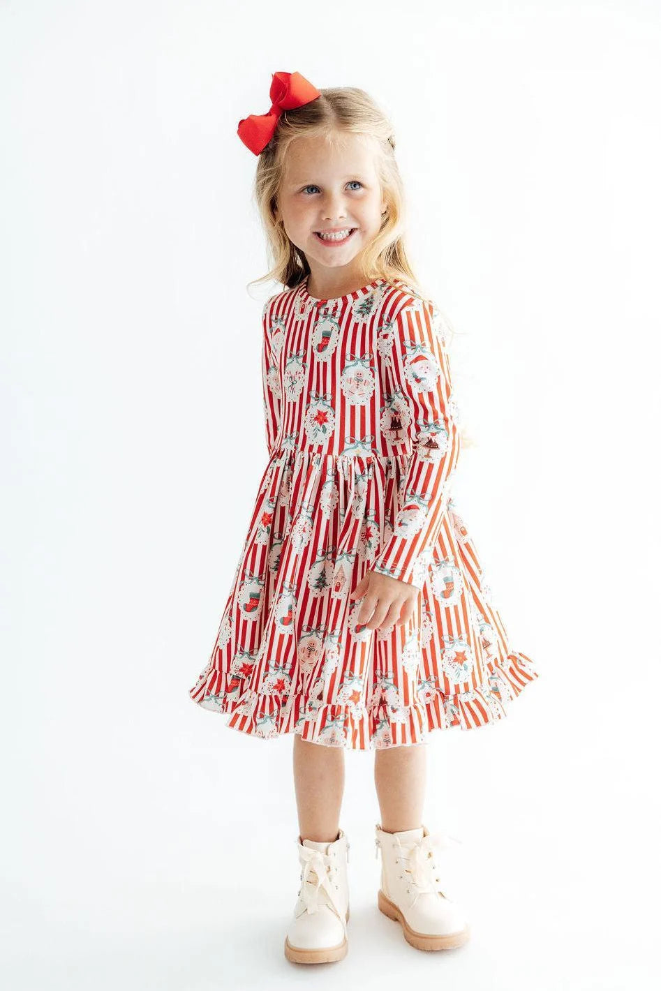 Model Wearing Mila & Rose Santa’s Sweet Schoppe Ruffle Hem Twirl Dress
