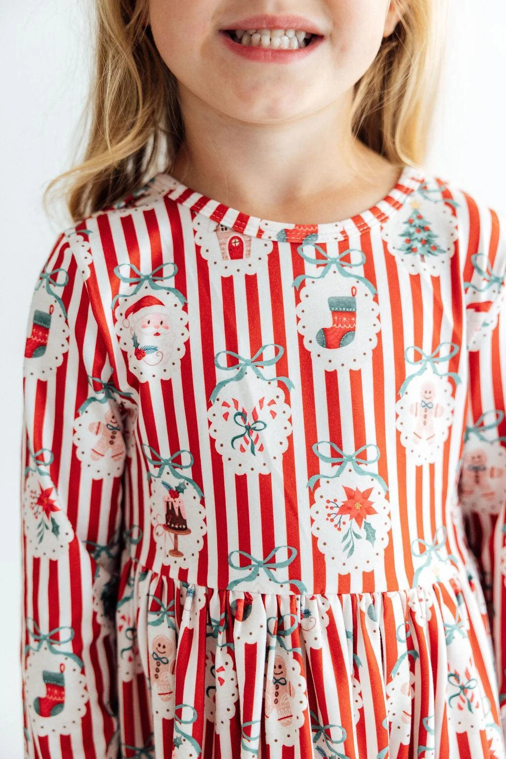 Model Wearing Mila & Rose Santa’s Sweet Schoppe Ruffle Hem Twirl Dress