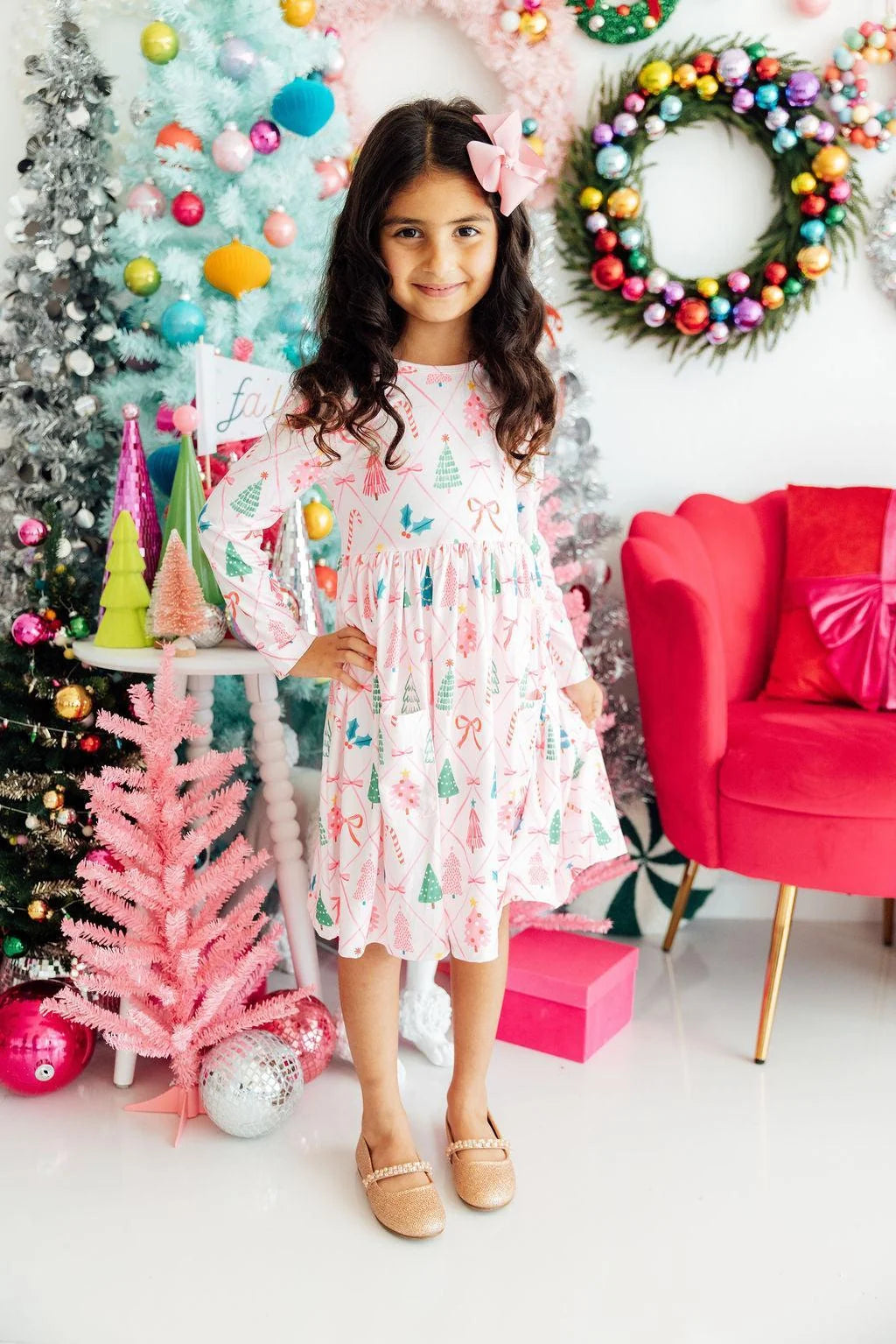 Model Wearing Mila & Rose Very Merry Long Sleeve Pocket Twirl Dress