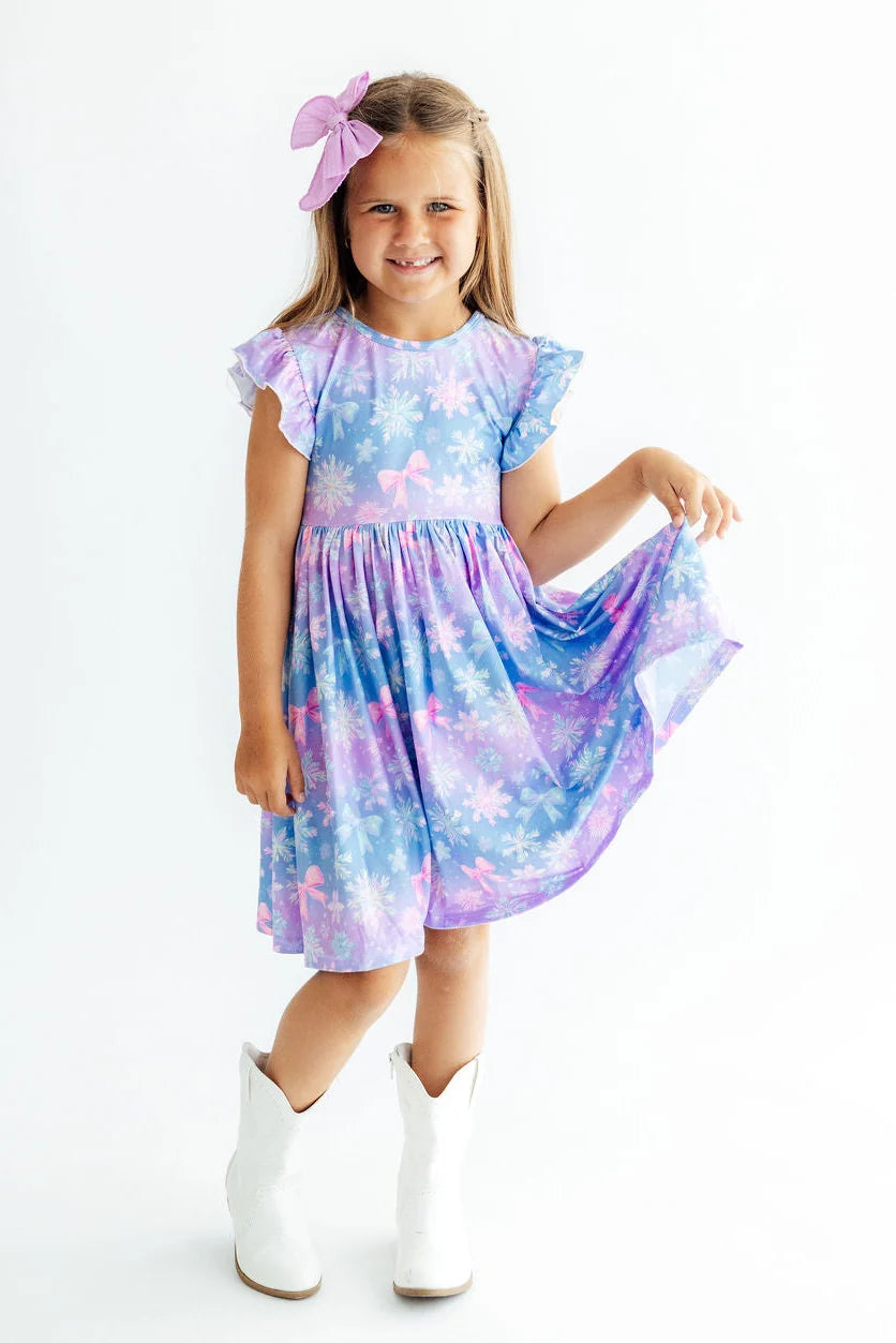 Model Wearing Mila & Rose Snow Much Sunshine Flutter Sleeve Dress