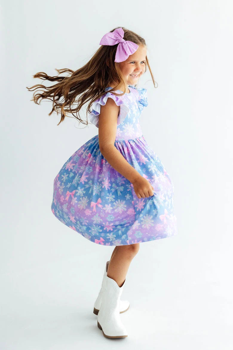 Model Wearing Mila & Rose Snow Much Sunshine Flutter Sleeve Dress