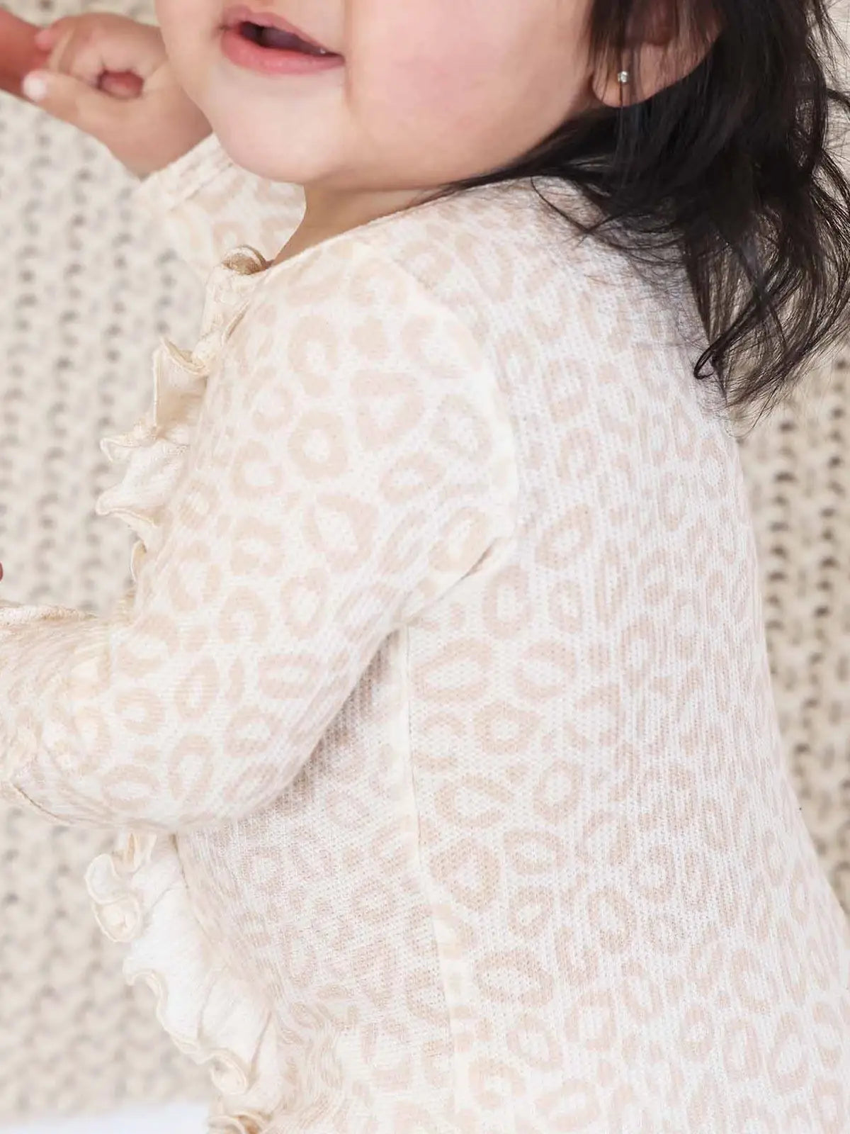 Model Wearing Caden Lane Bamboo Waffle Ruffle Zipper Footie | Lovely Leopard