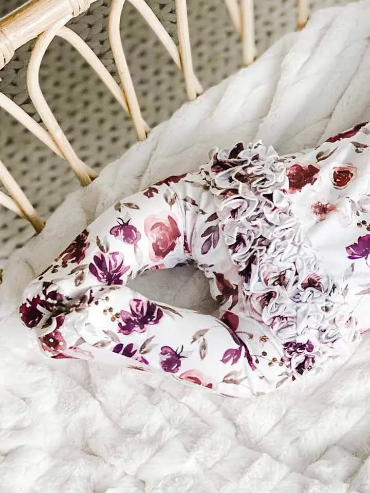 Model Wearing Caden Lane Demi's Dusty Purple Floral Ruffle Zipper Footie