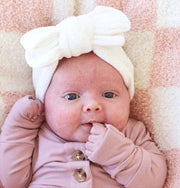 Model Wearing Caden Lane Large Knit Bow - Pearl White
