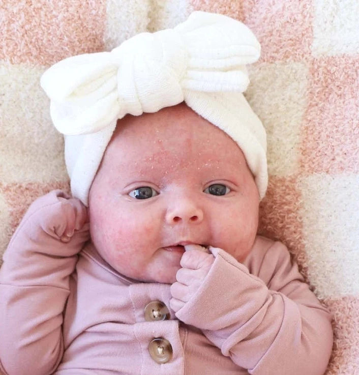 Model Wearing Caden Lane Large Knit Bow - Pearl White
