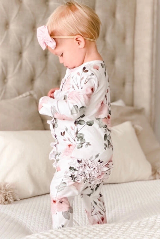 Model Wearing Caden Lane Millie's Dusty Rose Floral Ruffle Zipper Footie