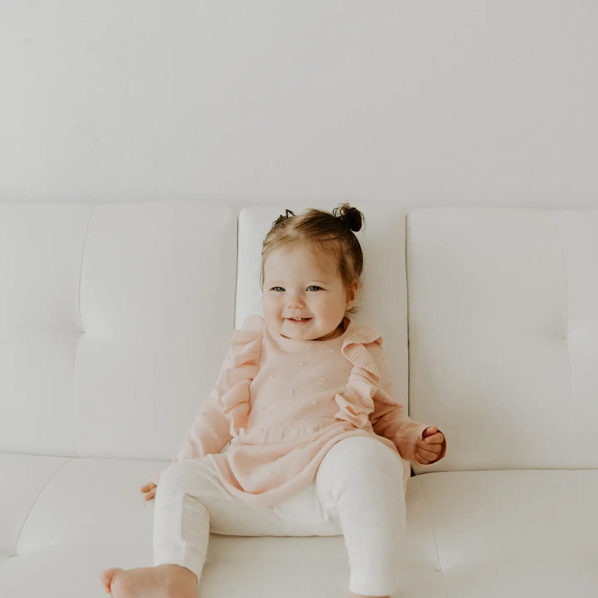 Model Wearing Viverano Organics Pointelle Knit Stretch Baby Leggings Pants (Organic Cotton)