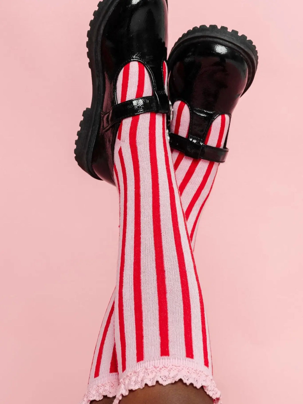 Model Wearing Little Stocking Co. Candy Stripe Lace Top Knee High Socks
