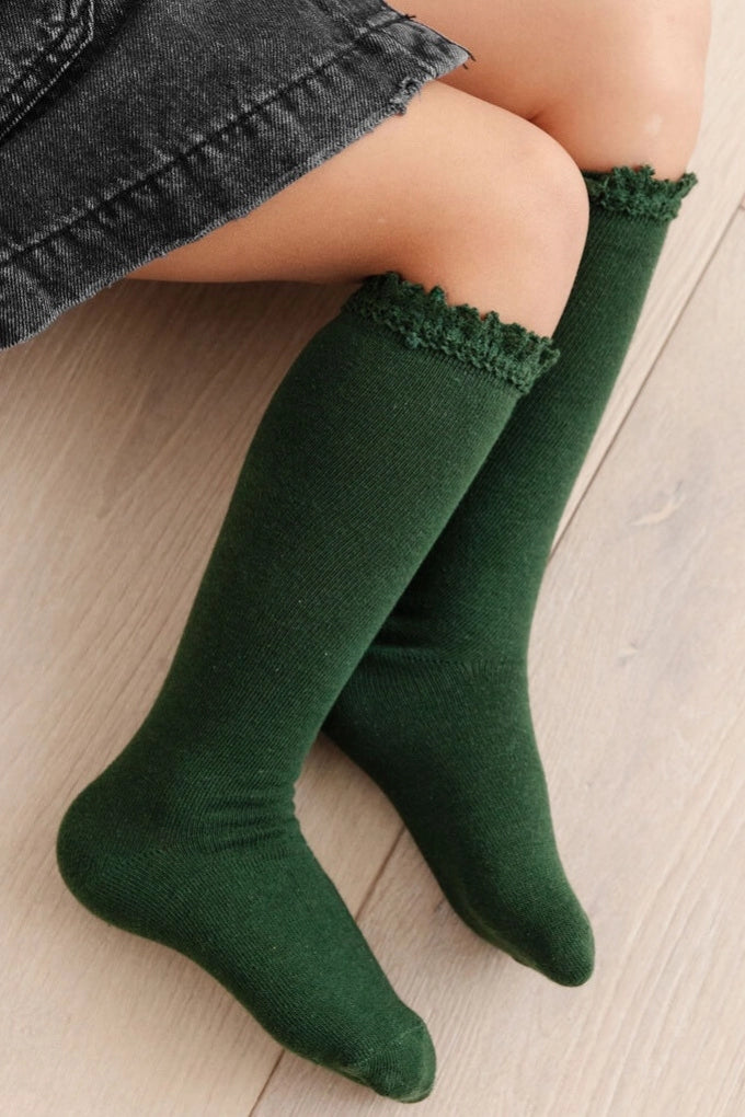Model Wearing Little Stocking Co. Forest Lace Top Knee High Socks