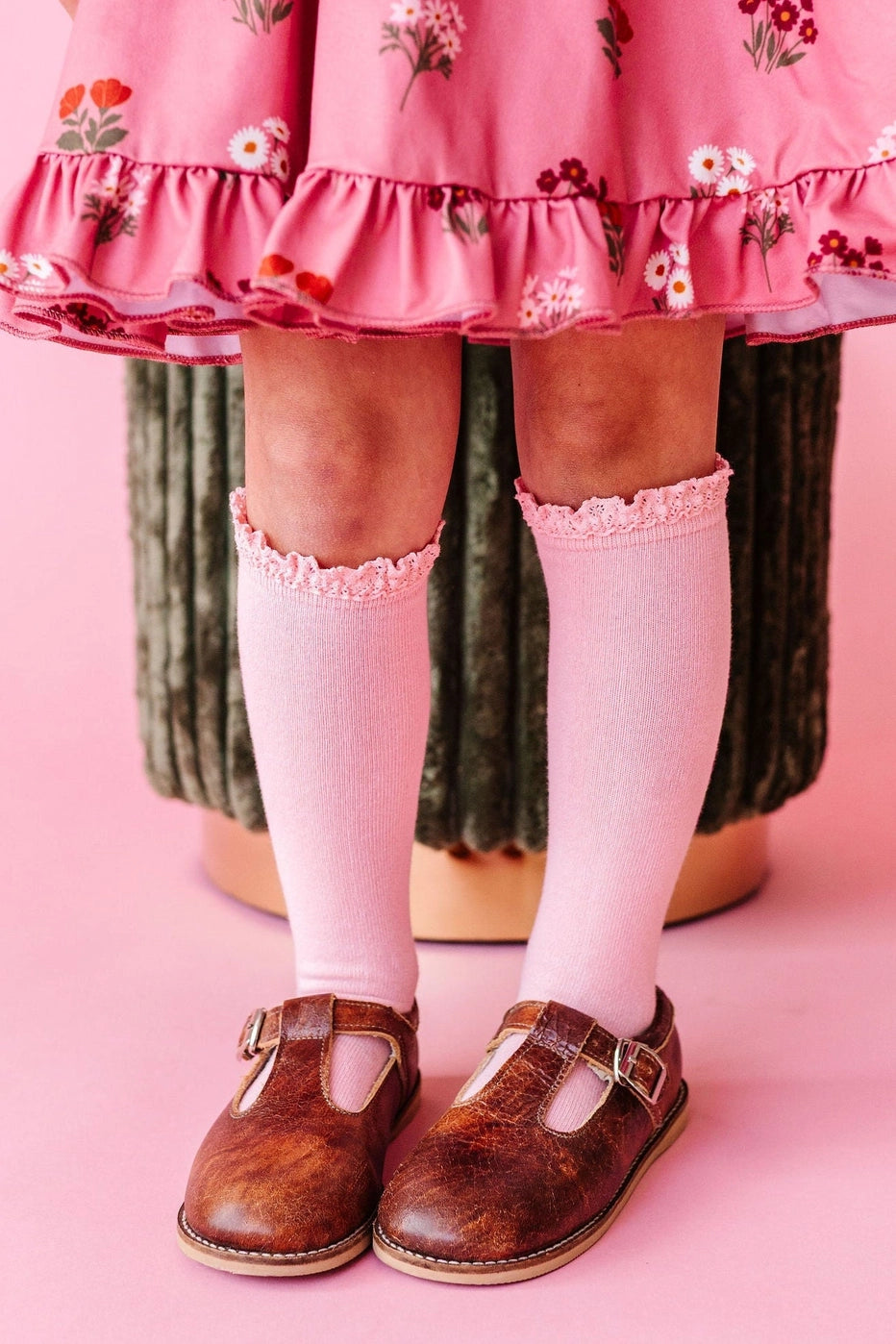 Model Wearing Little Stocking Co. Quartz Pink Lace Top Knee High Socks