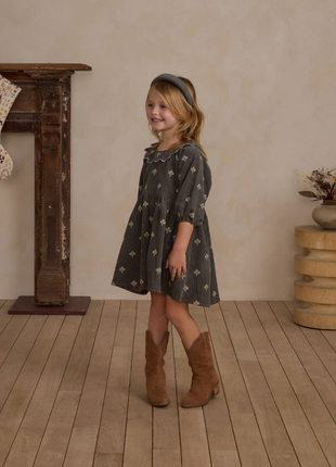 Young girl wearing Rylee + Cru Freya Dress Forest Floral