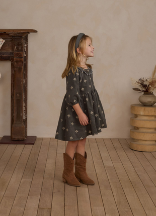 Young girl wearing Rylee + Cru Freya Dress Forest Floral