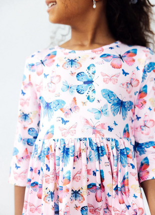 Model Wearing Mila & Rose Little Flutters 3/4 Sleeve Pocket Twirl Dress