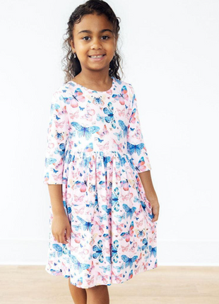 Model Wearing Mila & Rose Little Flutters 3/4 Sleeve Pocket Twirl Dress