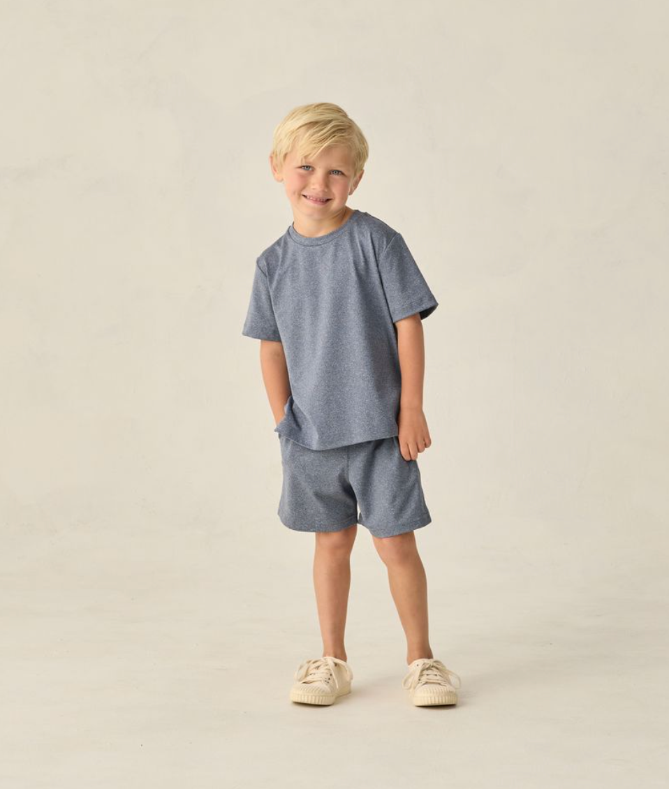 Model Wearing Rylee & Cru Oceanside Tech Short || Heathered Marine