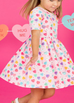 Model Wearing Rufflebutts + Ruggedbutts Girls Be My Valentine Short Sleeve Knit Twirl Dress