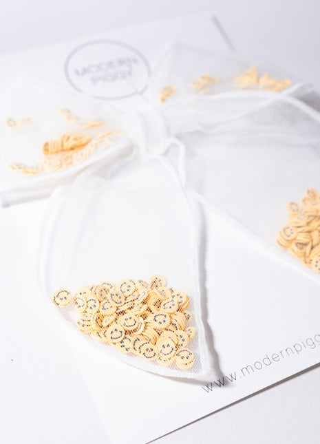 Smiley Face Shaker Party Bow
