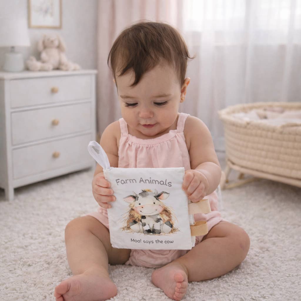 Model Playing With Ali + Oli Farm Animals – 10-Page Taggies Soft Crinkle Cloth Baby Book