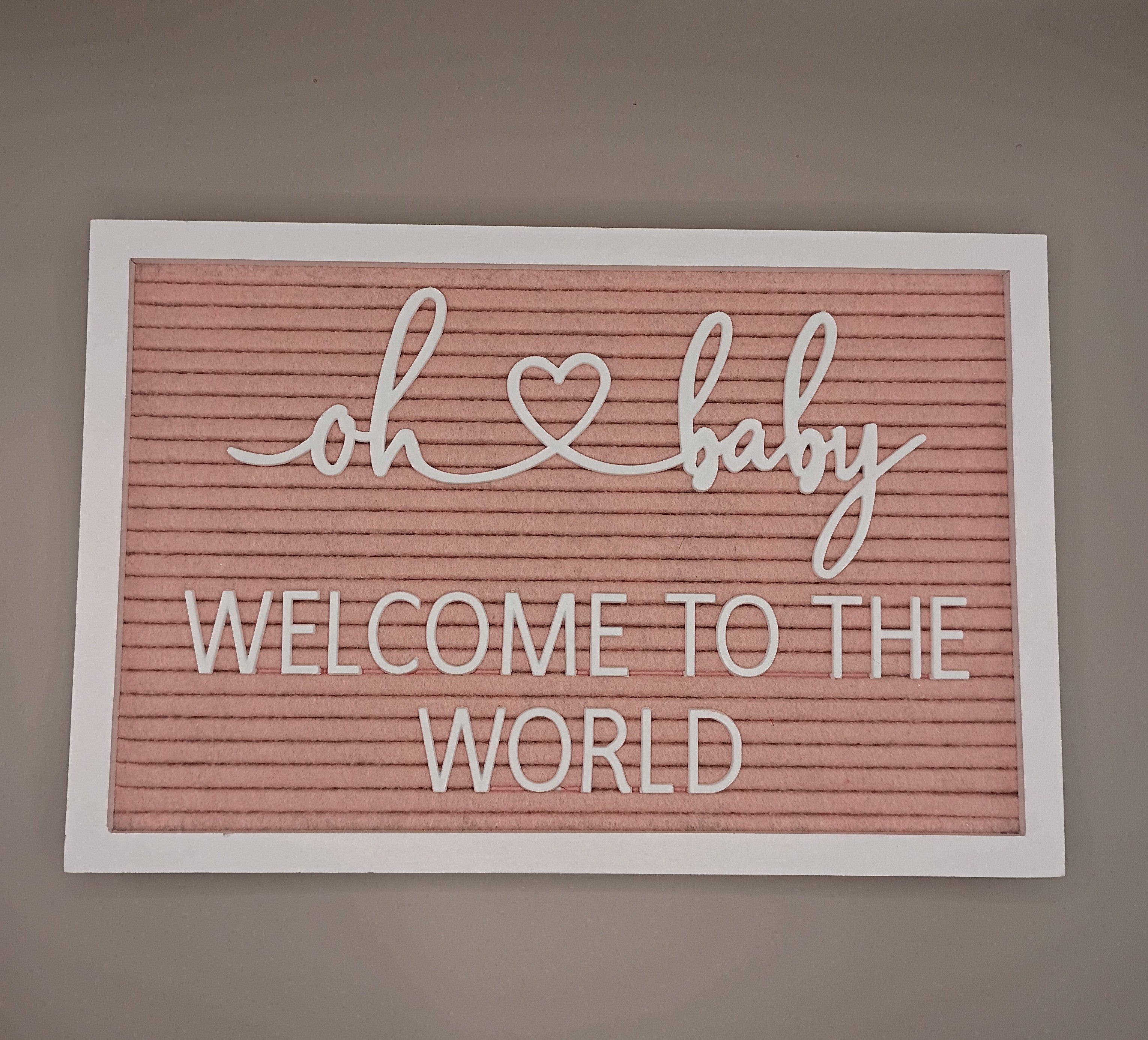 "Welcome To The World" Sign