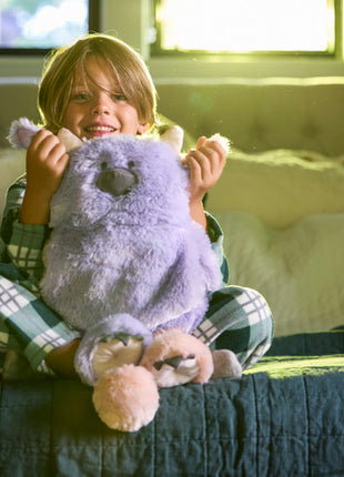 Model With Demdaco Calming Cuddlers Purple Monster Stuffed Animal 10"