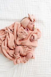 Model Wearing Lou Lou & Company Knit Booties - Petal Speckle