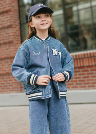 Model Wearing Rylee & Cru Varsity Jacket || Indigo Denim