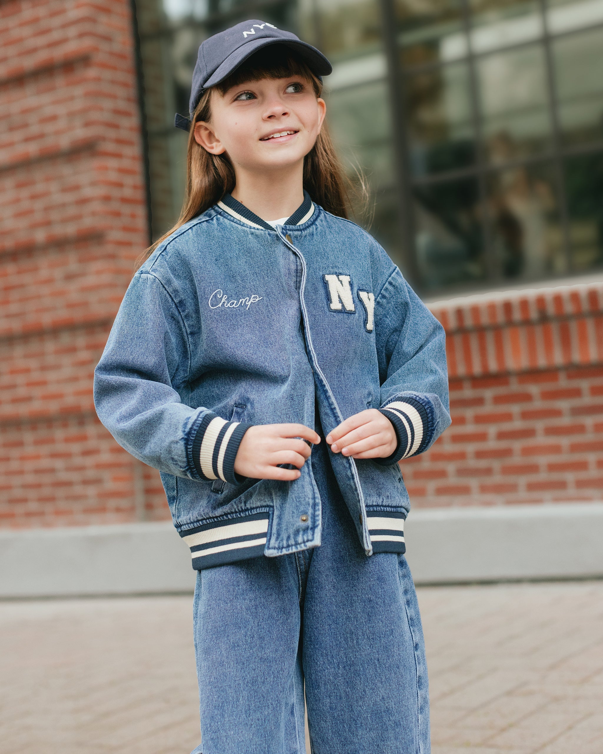 Model Wearing Rylee & Cru Varsity Jacket || Indigo Denim