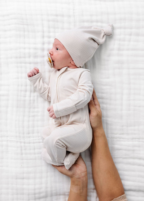 Model Wearing Lou Lou & Company Cove Ribbed Zipper Footies