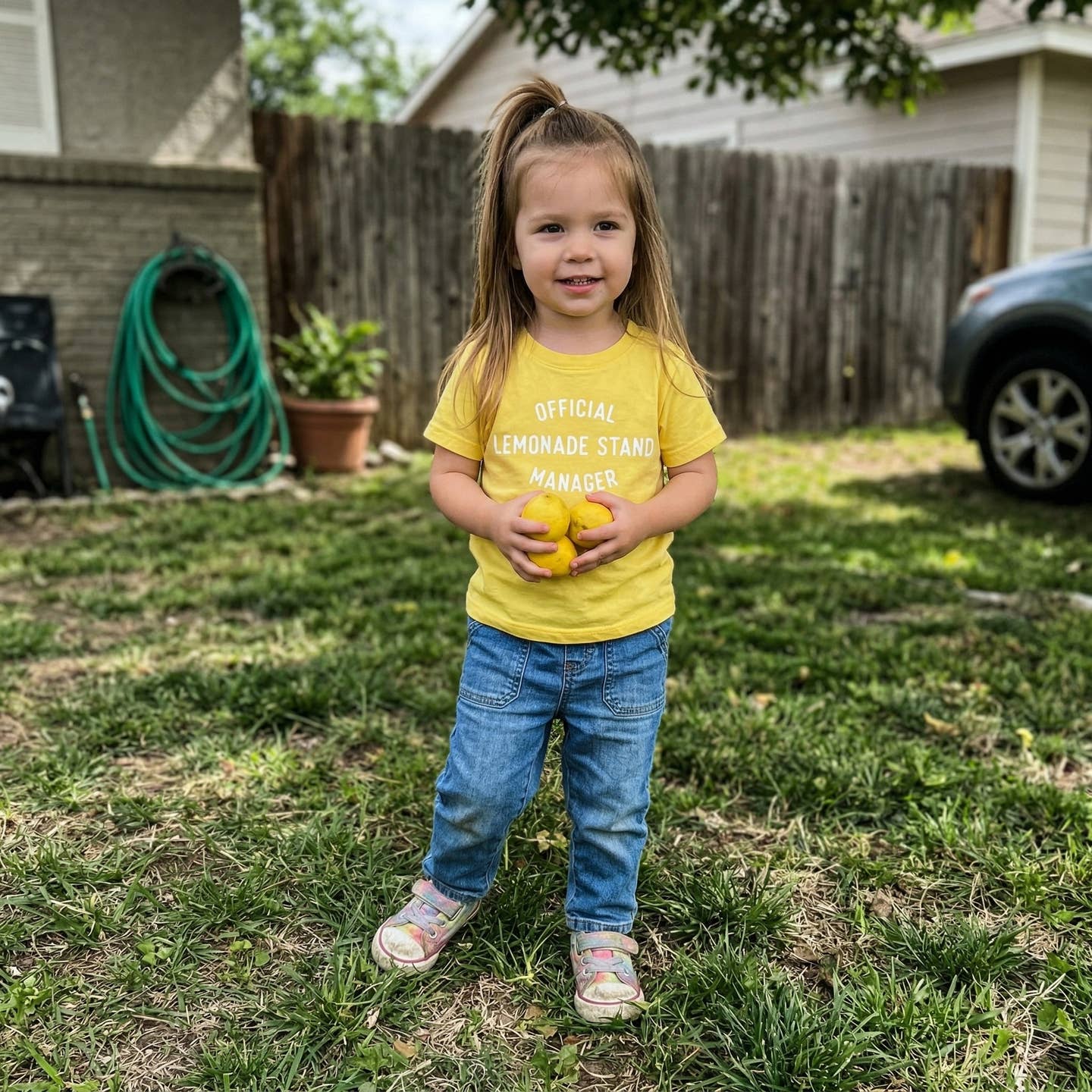 Model Wearing The Wishing Elephant Kids Lemonade Stand Manager Shirt Funny Summer Tee