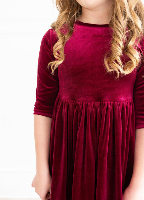 Model Wearing Mila & Rose Cranberry Velvet Twirl Dress