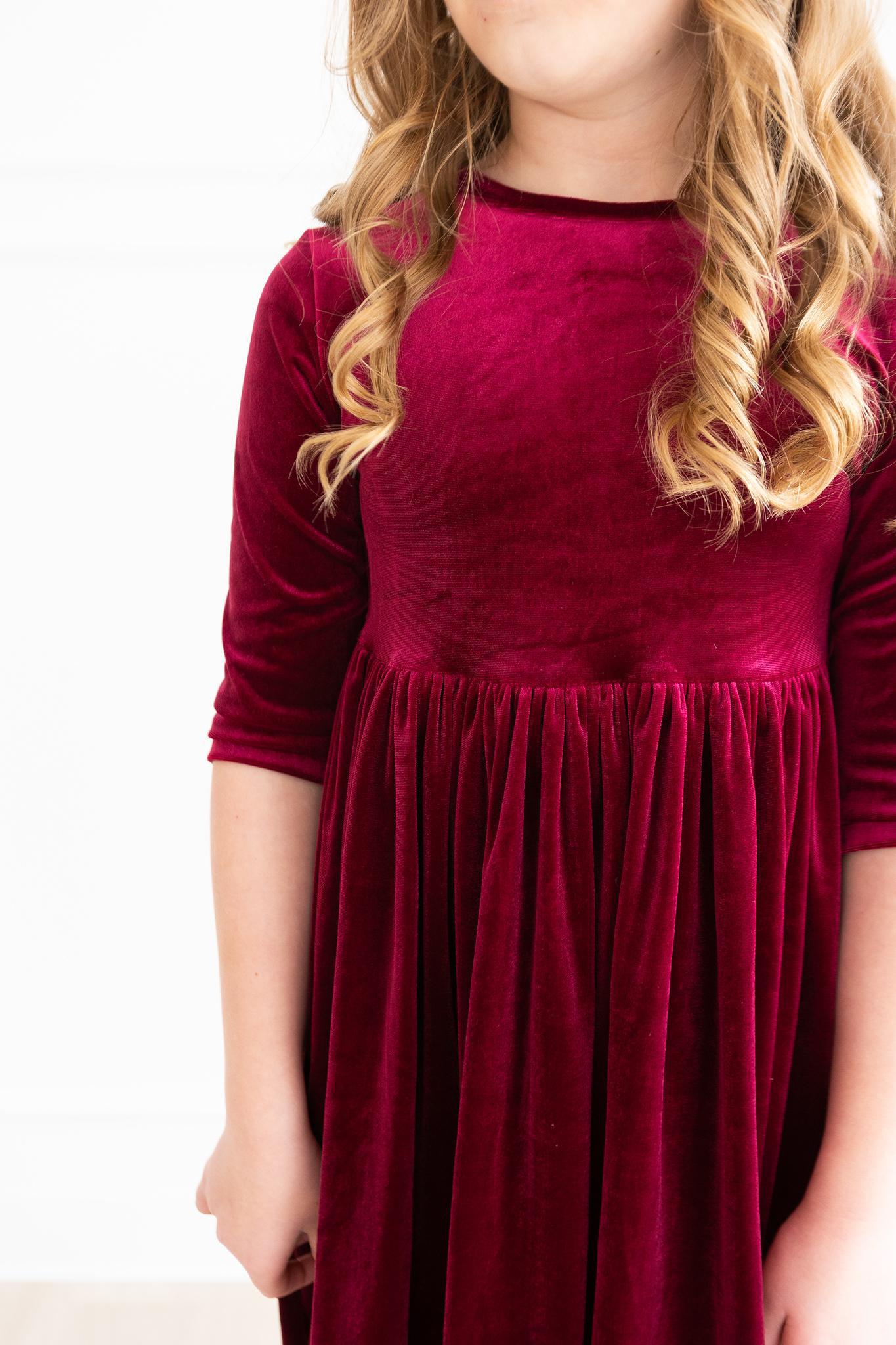 Model Wearing Mila & Rose Cranberry Velvet Twirl Dress