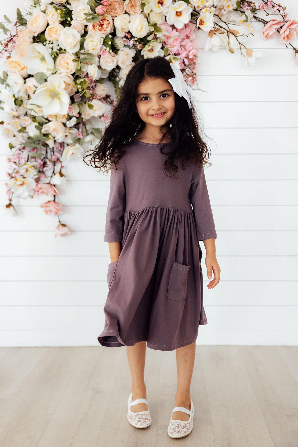 Model Wearing Mila & Rose Vintage Violet 3/4 Sleeve Pocket Twirl Dress