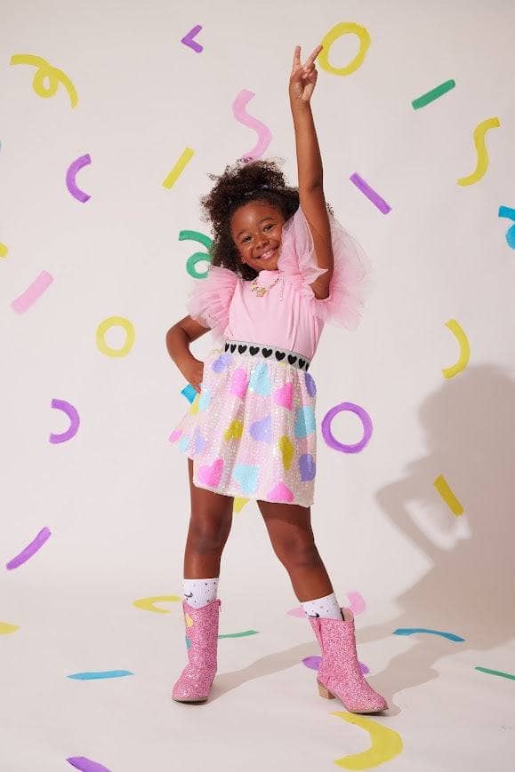 Model Wearing Lola And The Boys Candy Hearts Sequin Skirt