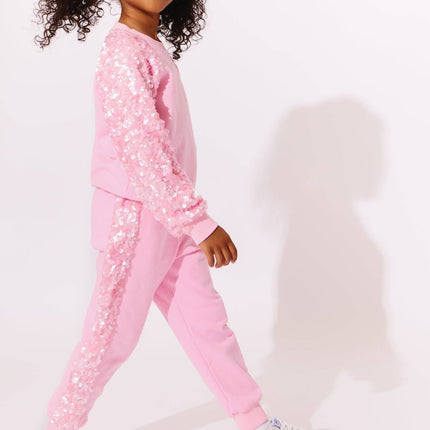 Model Wearing Lola And The Boys Pink Sequin Joggers Set