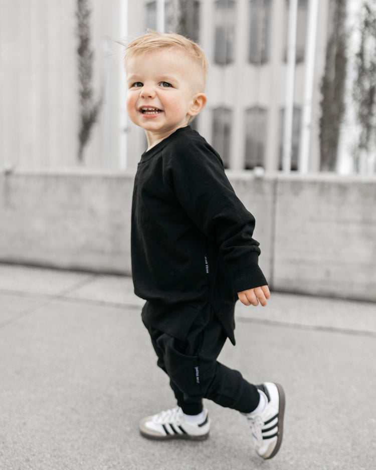 Model Wearing Little Bipsy Pullover - Black