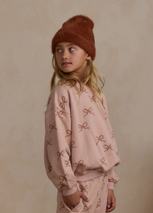 Young girl wearing Rylee + Cru Relaxed Bow Jogger Set