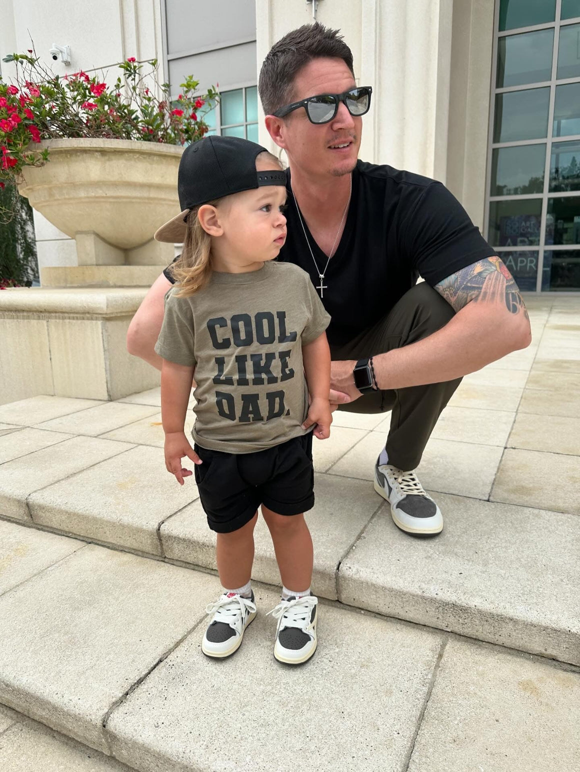 Model Wearing SBG Co. Cool Like Dad Black On Green Tee