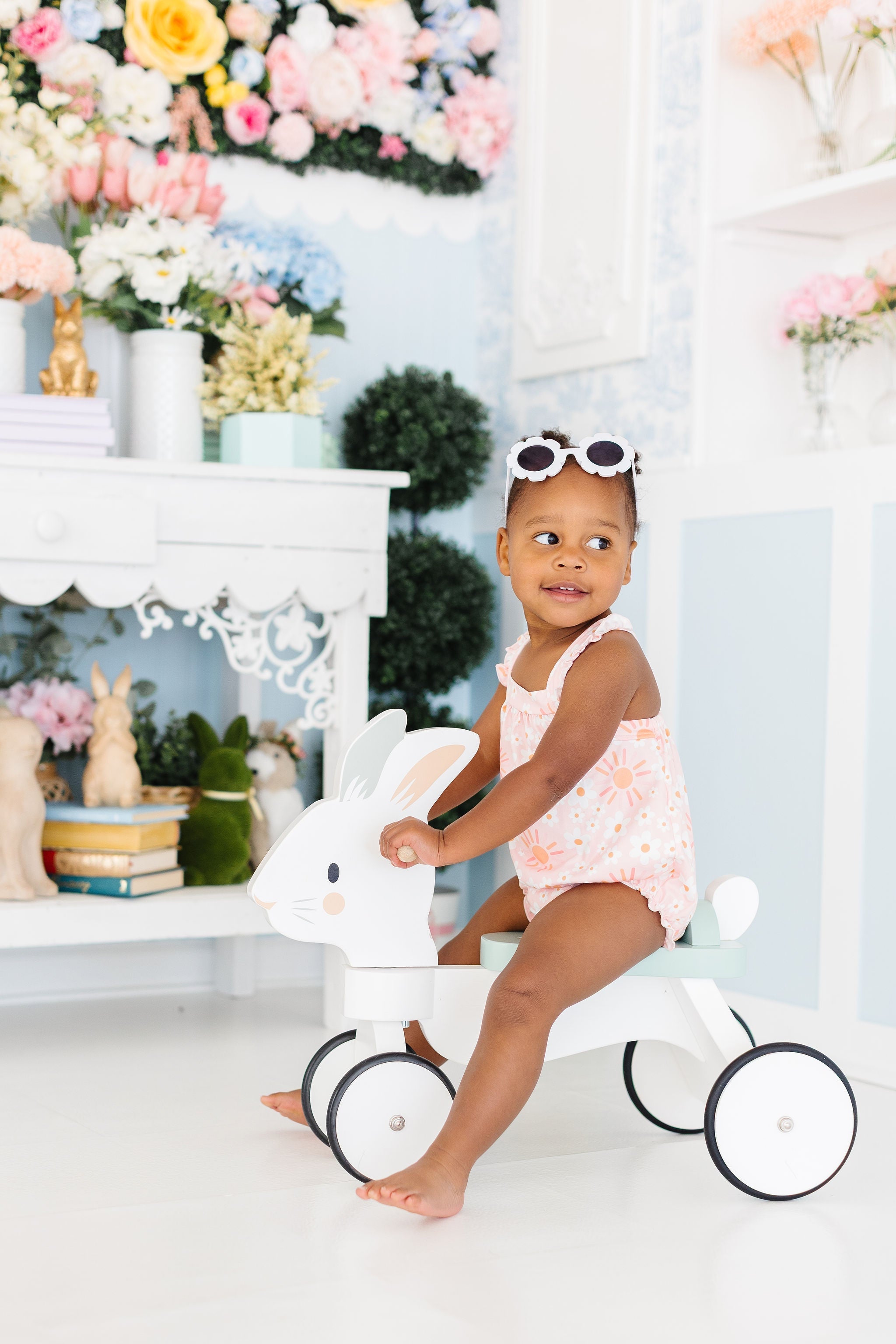 Model Wearing Mila & Rose Sweet & Sunny Ruffle Cross Back Romper