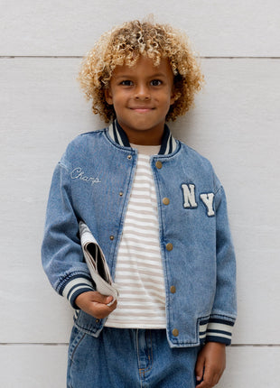 Model Wearing Rylee & Cru Varsity Jacket || Indigo Denim