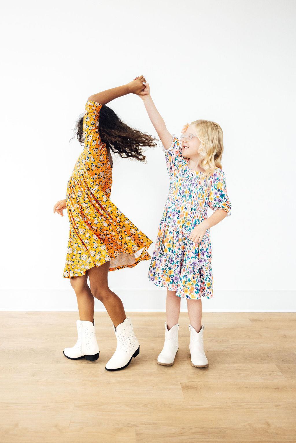Model Wearing Mila & Rose Fall Floral 3/4 Sleeve Pocket Twirl Dress