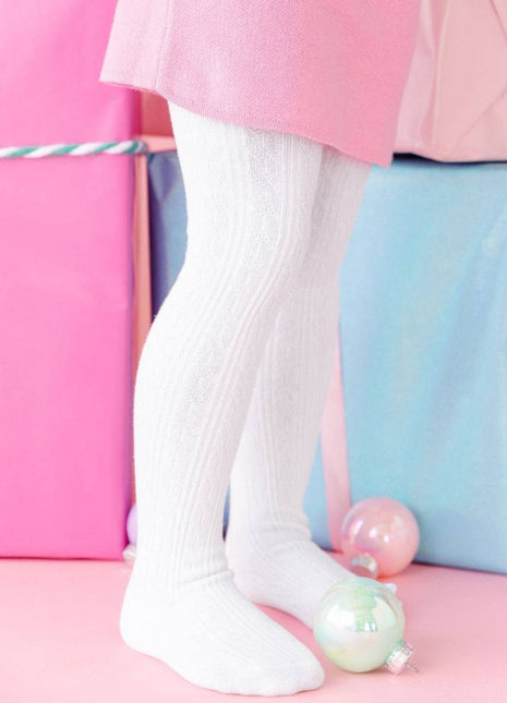 Model Wearing Little Stocking Co. White Cable Knit Tights