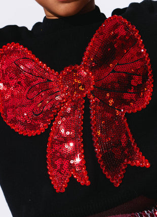 Model Wearing Lola And The Boys Big Bow Sweater