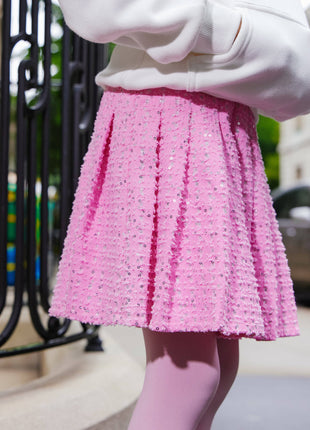 Model Wearing Lola And The Boys Pink Denim Sparkle Pleated Skirt