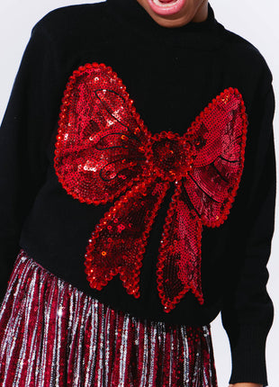 Model Wearing Lola And The Boys Big Bow Sweater