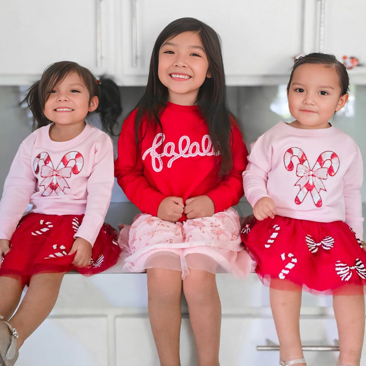 Model Wearing Sweet Wink Candy Cane Bow Printed Christmas Tutu