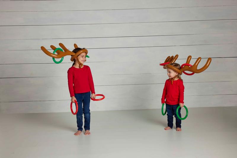 Kids playing Mudpie Reindeer Ring Toss Game Set
