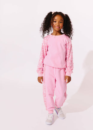 Model Wearing Lola And The Boys Pink Sequin Joggers Set