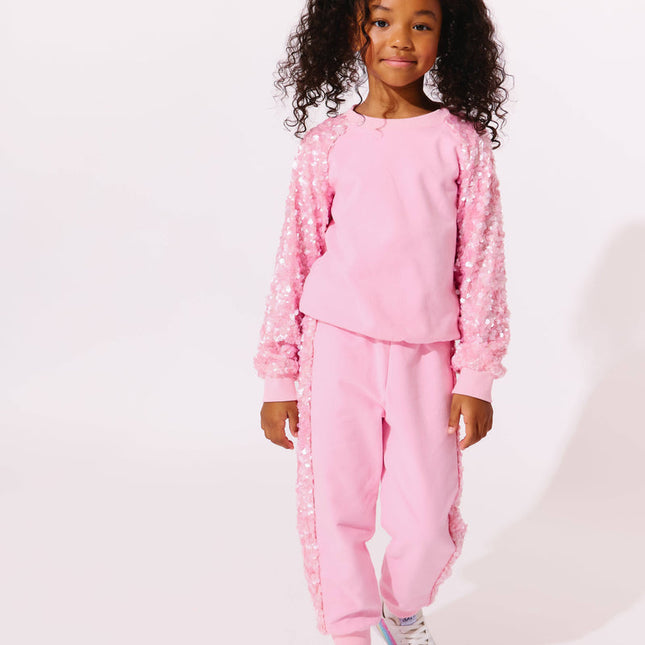 Model Wearing Lola And The Boys Pink Sequin Joggers Set