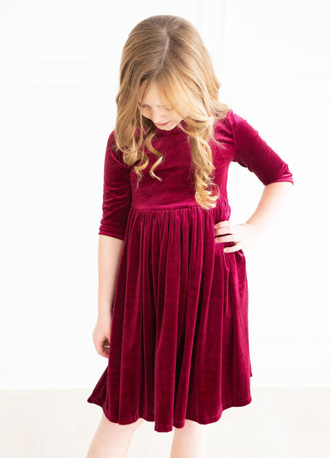 Model Wearing Mila & Rose Cranberry Velvet Twirl Dress