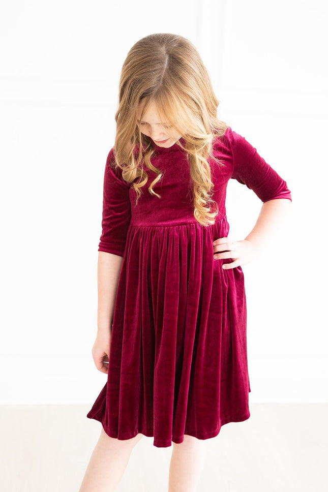 Model Wearing Mila & Rose Cranberry Velvet Twirl Dress
